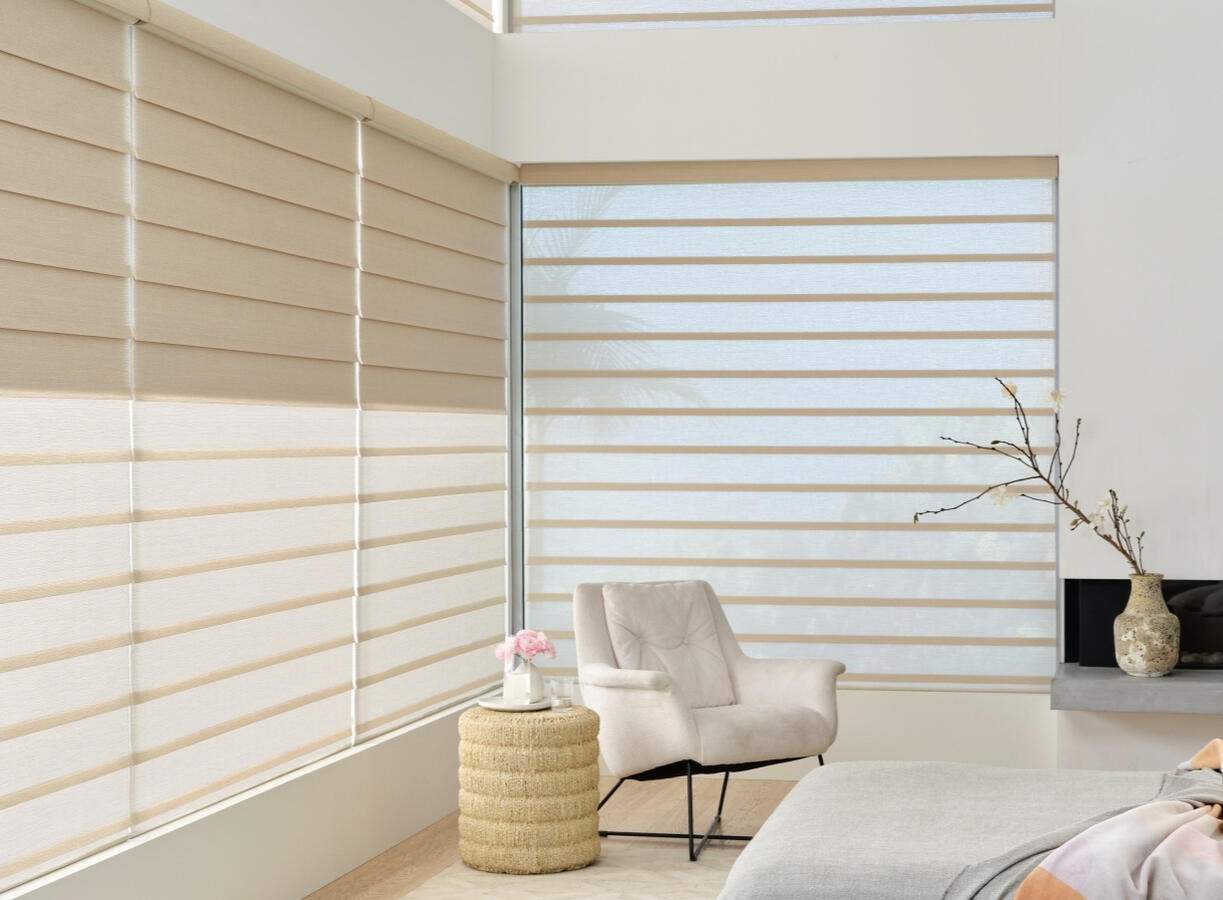 Vignette® Modern Roman Shades — soft folds with a clean, tailored finish. Hunter Douglas.